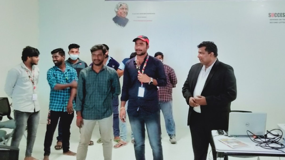 Suresh Natarajan with participants at a corporate training session